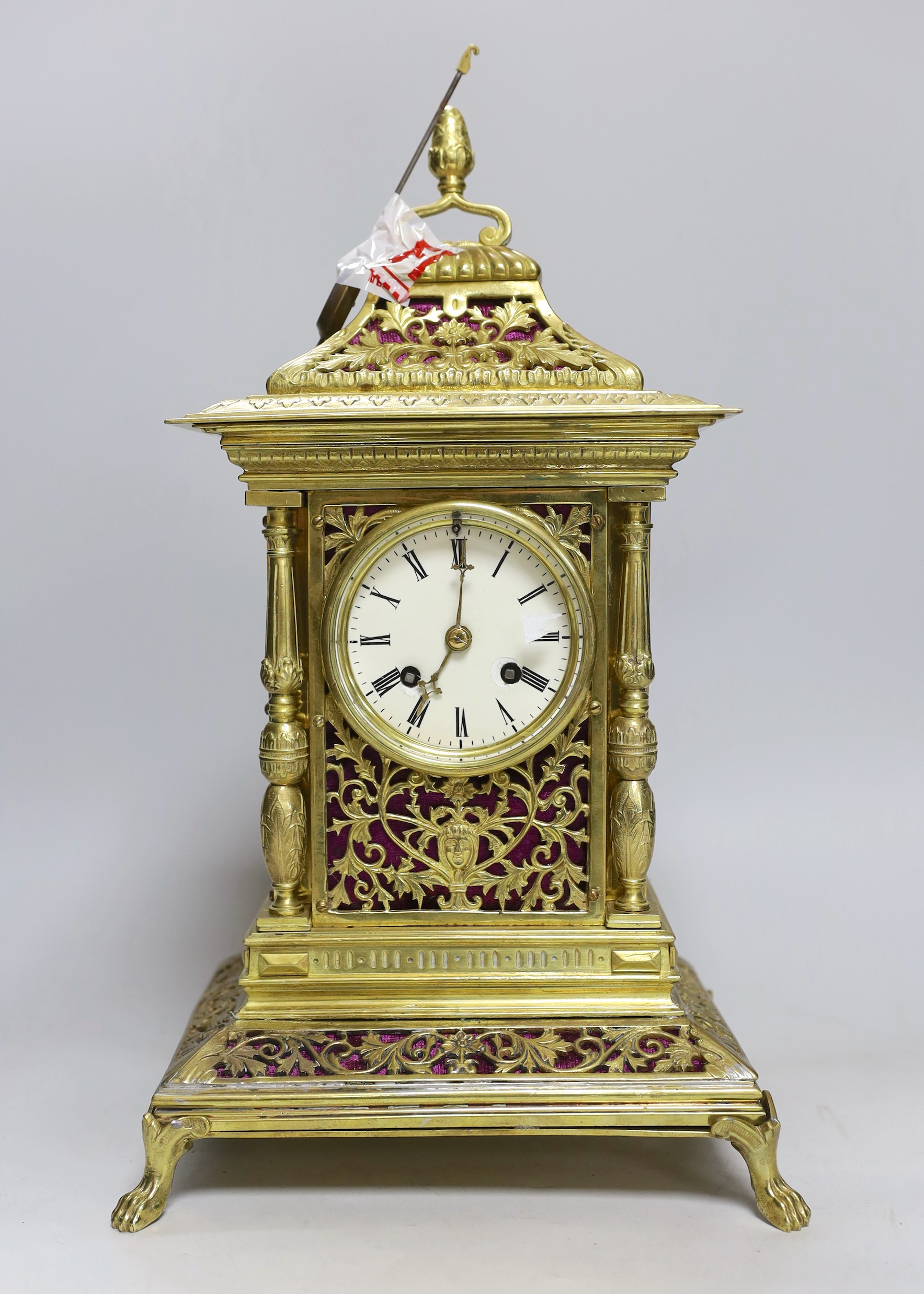A French cast brass mantel clock in period style, 42cms high